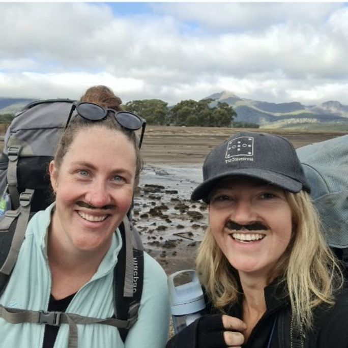 Photo of hikers hikers Steph Brake and Lauren Thomas, smiling to camera.